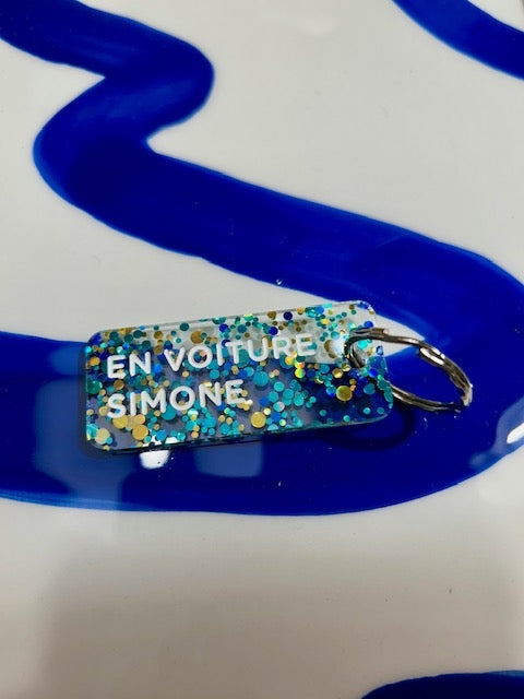 Porte clés à paillettes - En voiture Simone - Bleu/or/vert
