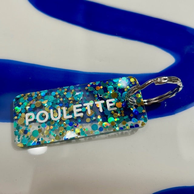 Porte clés à paillettes - Poulette - Bleu/or/vert