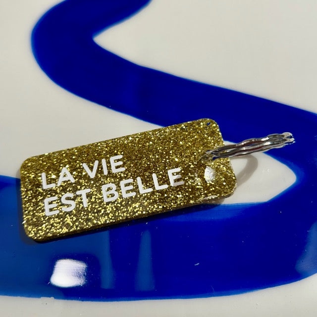 Porte clés à paillettes - La vie est belle - Or