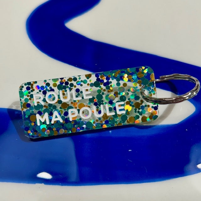 Porte clés à paillettes - Roule ma poule - Bleu/or/vert