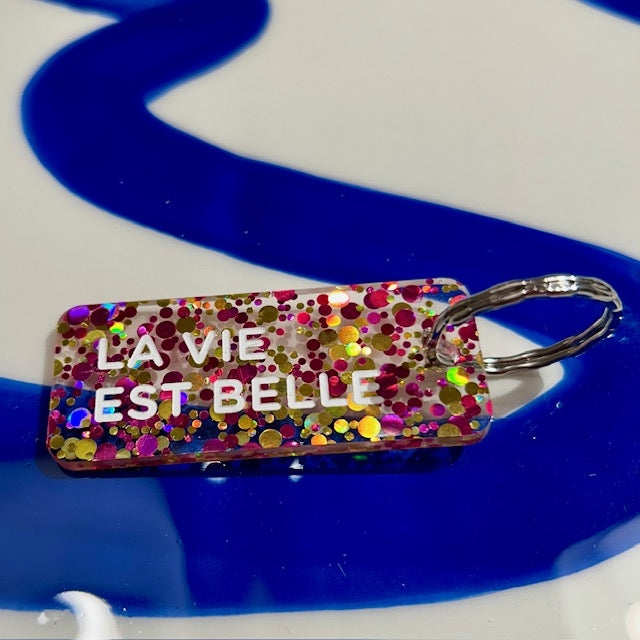 Porte clés à paillettes - La vie est belle - Fuchsia/or