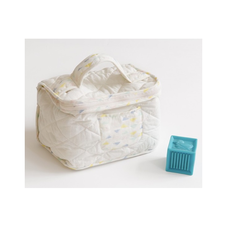 trousse de toilette blanche triangles