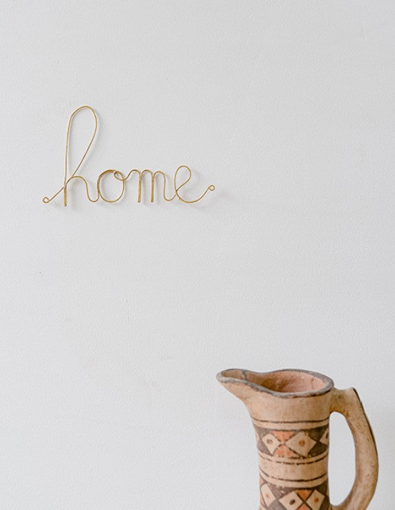 Mot en laiton doré - home