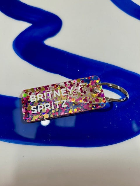 Porte clés à paillettes - Britney Spritz - Fuchsia/or