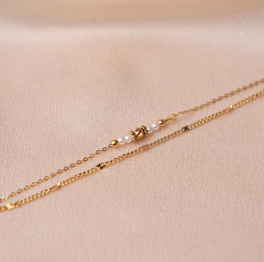 Bracelet double perles blanches